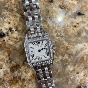Cartier women’s tank watch with diamonds
